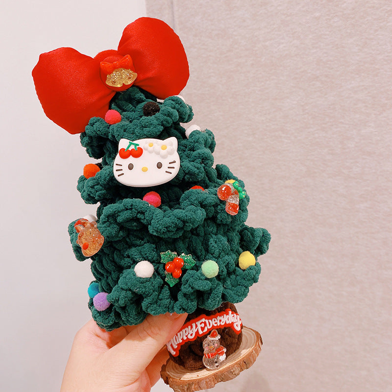 Plush crocheted Christmas tree ornament