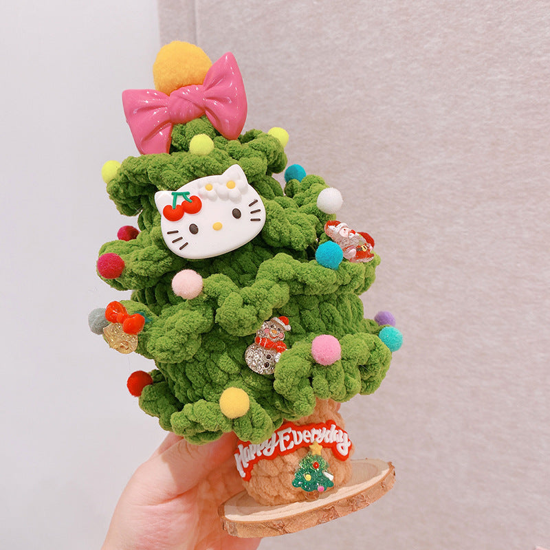 Plush crocheted Christmas tree ornament